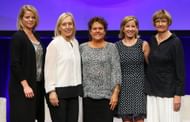 Evert and Evonne Goolagong Cawley pose alongside fellow former players